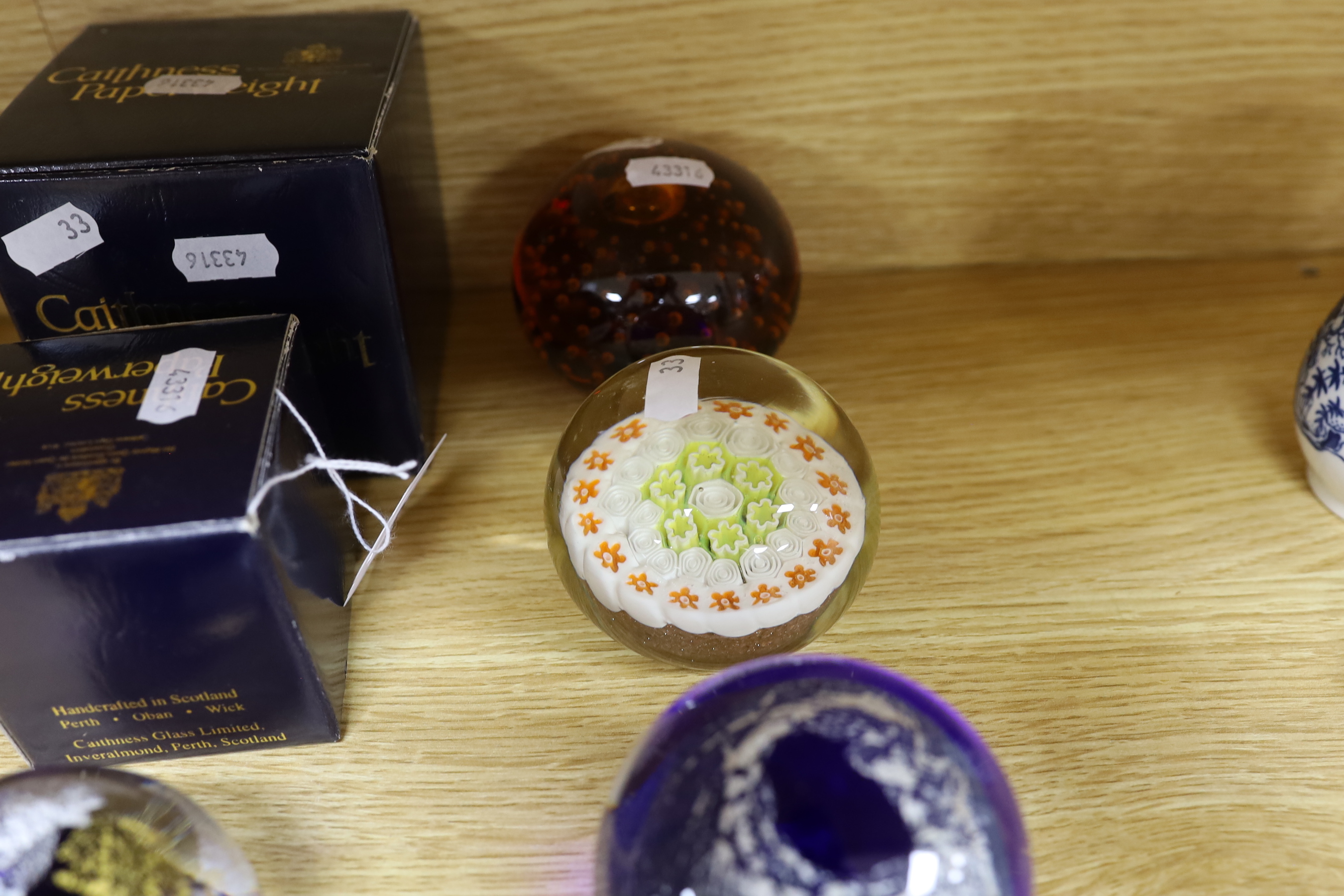 A selection of thirteen mixed decorative paperweights